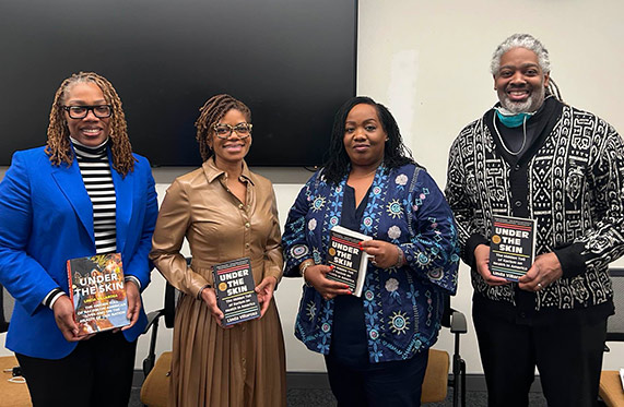 UI Health staff and employees participating in a book club