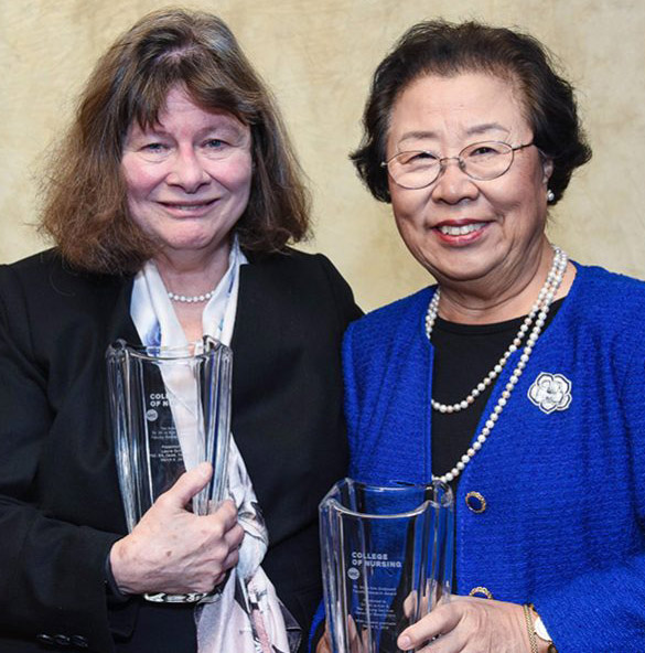 Photo of Mi Ja Kim with Laurie Quinn