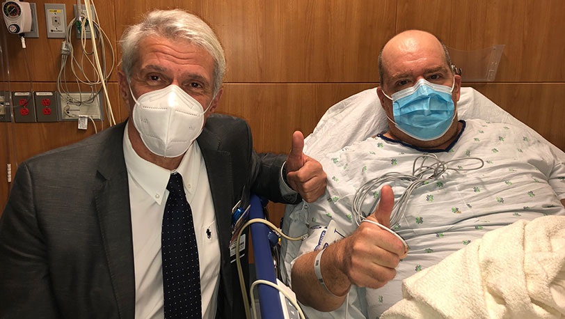 . Pier Giulianotti, director of the Robotic Surgery Program at UI Health, with patient Christopher Adamsick on Sept. 24, 2020. Adamsick is the world’s first polycystic kidney disease patient to receive a robotic double nephrectomy and kidney transplant.