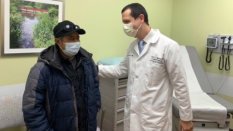 Jose Gomez, of Chicago, visits with UI Health transplant surgeon Dr. Jorge Almario Alvarez the Spanish Language Kidney Transplant Clinic.