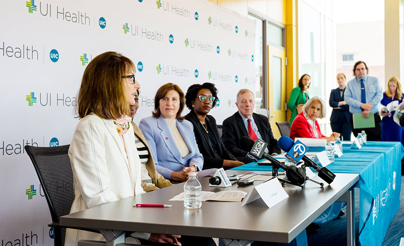 Anne Elizabeth Glassgow, co-principal investigator of the Maternal Health Research Center of Excellence, speaks at the roundtable.