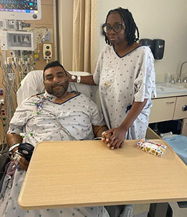 Luciano And Darlene in hospital room