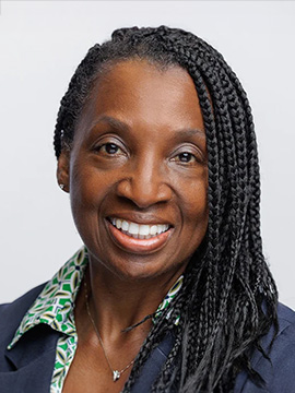 A woman smiling at the camera