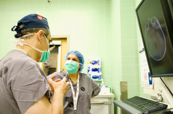 Drs.  Afshari and  Slavin   in the operating room.